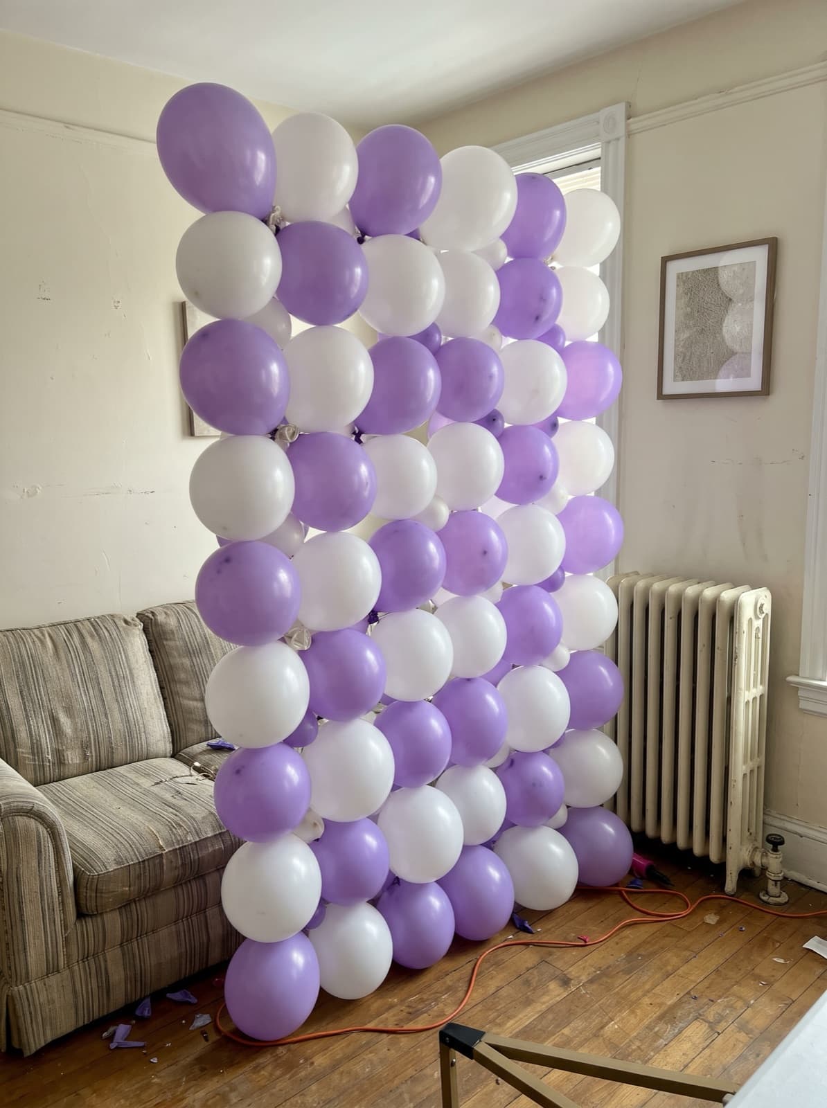Grid balloon wall in a lavender and white checkerboard